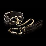 <strong>Ошейник с поводком Collar   Leash</strong> <br />
Чёрный ошейник из кожи под крокодила имеет мягкую плюшевую подкладку, которая комфортно ощущается на коже. <div class="charTableblock"><div><span>Материал</span>: кожзам</div><div><span>Цвет</span>: черный</div><div><span>Производитель</span>: PipeDream, США</div></div> Ошейник с поводком Collar   Leash 
Чёрный ошейник из кожи под крокодила имеет мягкую плюшевую подкладку, которая комфортно ощущается на коже.