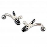 <strong>Металлические зажимы на соски с бубенчиками</strong> <br />
Зажимы для воздействия на соски с резиновыми чехольчиками на концах. <div class="charTableblock"><div><span>Тип</span>: для сосков</div><div><span>Производитель</span>: Erotic Fantasy, Швейцария</div></div> Металлические зажимы на соски с бубенчиками 
Зажимы для воздействия на соски с резиновыми чехольчиками на концах.